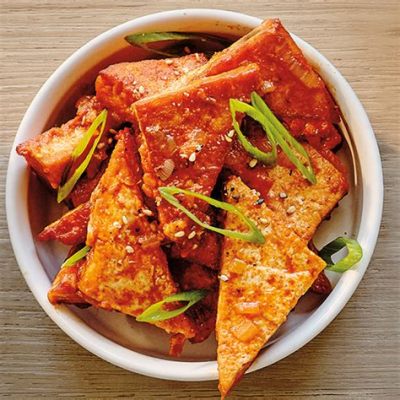  Spicy Braised Tofu with Pork: Can This Unexpected Duo Deliver an Explosion of Savory Flavor and a Velvet Smooth Texture?